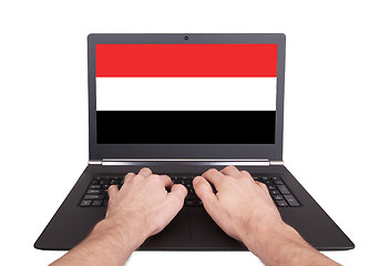 Image showing Hands working on laptop, Yemen