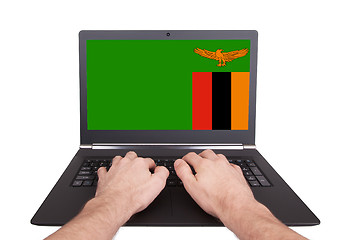 Image showing Hands working on laptop, Zambia