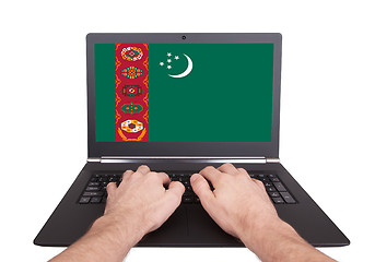 Image showing Hands working on laptop, Turkmenistan