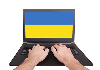 Image showing Hands working on laptop, Ukraine