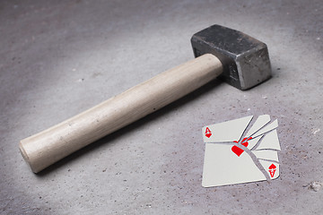 Image showing Hammer with a broken card, ace of hearts