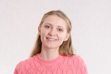 Image showing Portrait of smiling girl on a light background