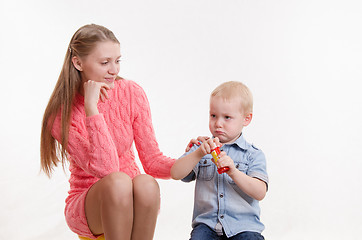 Image showing The boy ran out soap bubbles