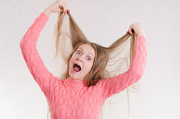 Image showing Girl shocked by her hair