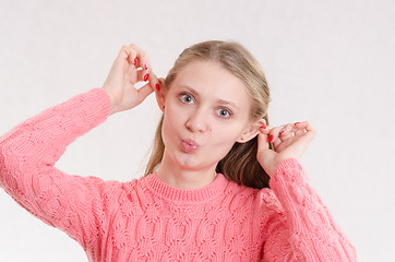 Image showing Portrait of cheerful girl grimace