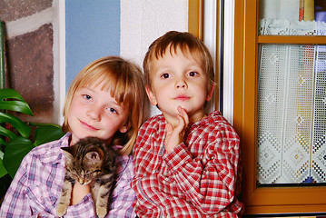 Image showing children and cat