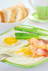 Image showing breakfast with bacon and fried eggs