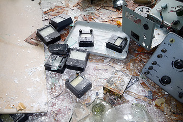 Image showing broken physical devices in room