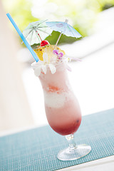 Image showing Fruity Tropical Drink with Pineapple and Umbrullas