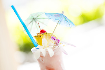 Image showing Fruity Tropical Drink with Pineapple and Umbrullas