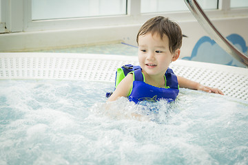 Image showing Mixed Race Boy Having Fun at the Water Park