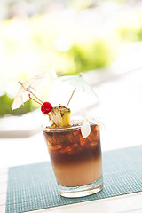 Image showing Ice Cold Mai Tai Cocktail Drink with Fruit and Umbrullas