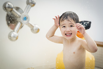 Image showing Mixed Race Boy Having Fun at the Water Park