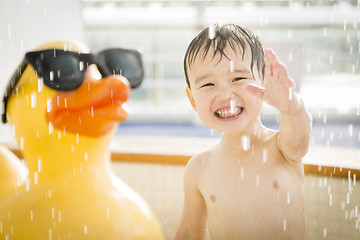 Image showing Mixed Race Boy Having Fun at the Water Park