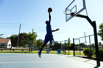 Image showing Basketball Dunk Outdoors
