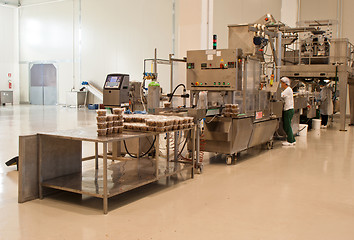 Image showing production of olives. packing machine