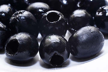 Image showing Black pitted olives isolated 