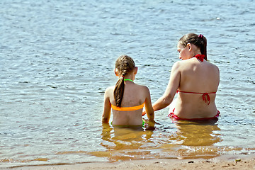 Image showing Mother and daughter in the water