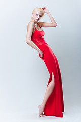 Image showing attractive blond girl in red dress