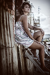 Image showing girl sitting on the stairs 