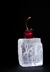 Image showing Fresh sweet cherry on black