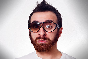 Image showing funny man with fancy broken glasses