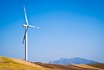 Image showing Wheatfield with windmills