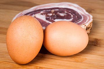 Image showing eggs and bacon slice