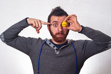 Image showing amazed man point at golf ball