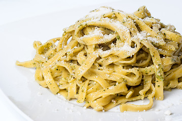 Image showing pasta with pesto on white plate