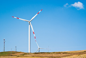 Image showing Wheatfield with windmills