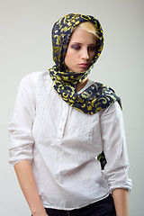 Image showing attractive blond girl in scarf and white shirt