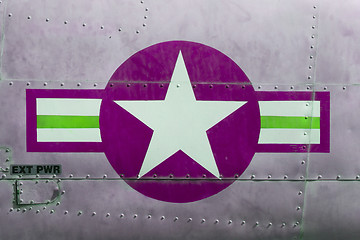 Image showing Tail of Vietnam war Airplane, purple