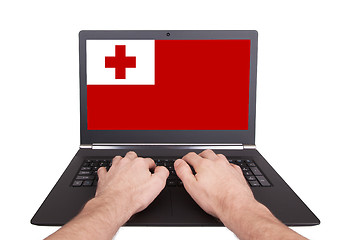 Image showing Hands working on laptop, Tonga