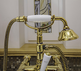 Image showing gold bathtub faucets and shower head