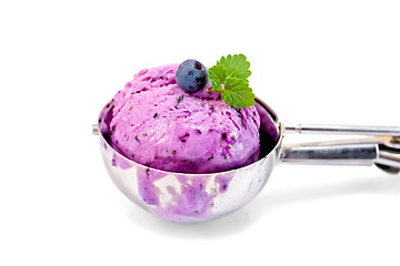 Image showing Ice cream blueberry in spoon with mint