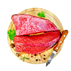 Image showing Meat beef with parsley on round board top