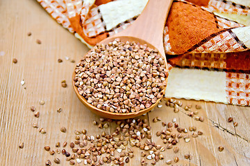 Image showing Buckwheat in spoon and napkin on board