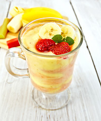 Image showing Dessert milk strawberry and banana on light board
