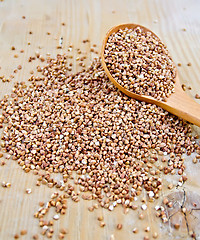 Image showing Buckwheat with spoon on board