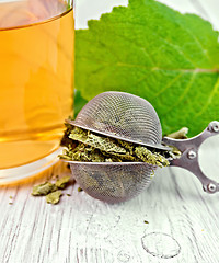 Image showing Sage dried in strainer with mug