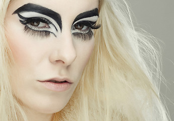 Image showing Beautiful blond girl with cat eyes make-up