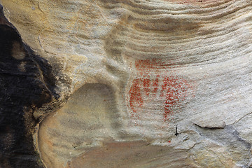 Image showing Prehistoric aboriginal hand print using red ochre Australia