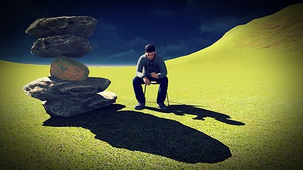 Image showing Young man  talking on his mobile 