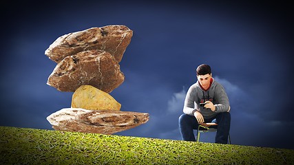 Image showing Young man  talking on his mobile 