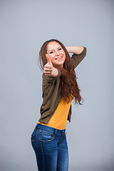 Image showing Woman showing thumbs up