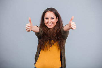 Image showing Woman showing thumbs up