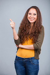Image showing Woman showing thumbs up