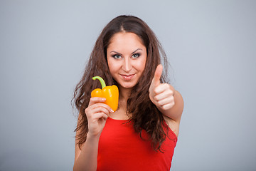 Image showing Woman with bell pepper