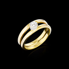 Image showing Gold Diamond ring on black background